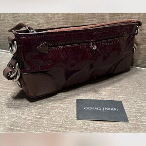 Donald J Pliner patent leather clutch